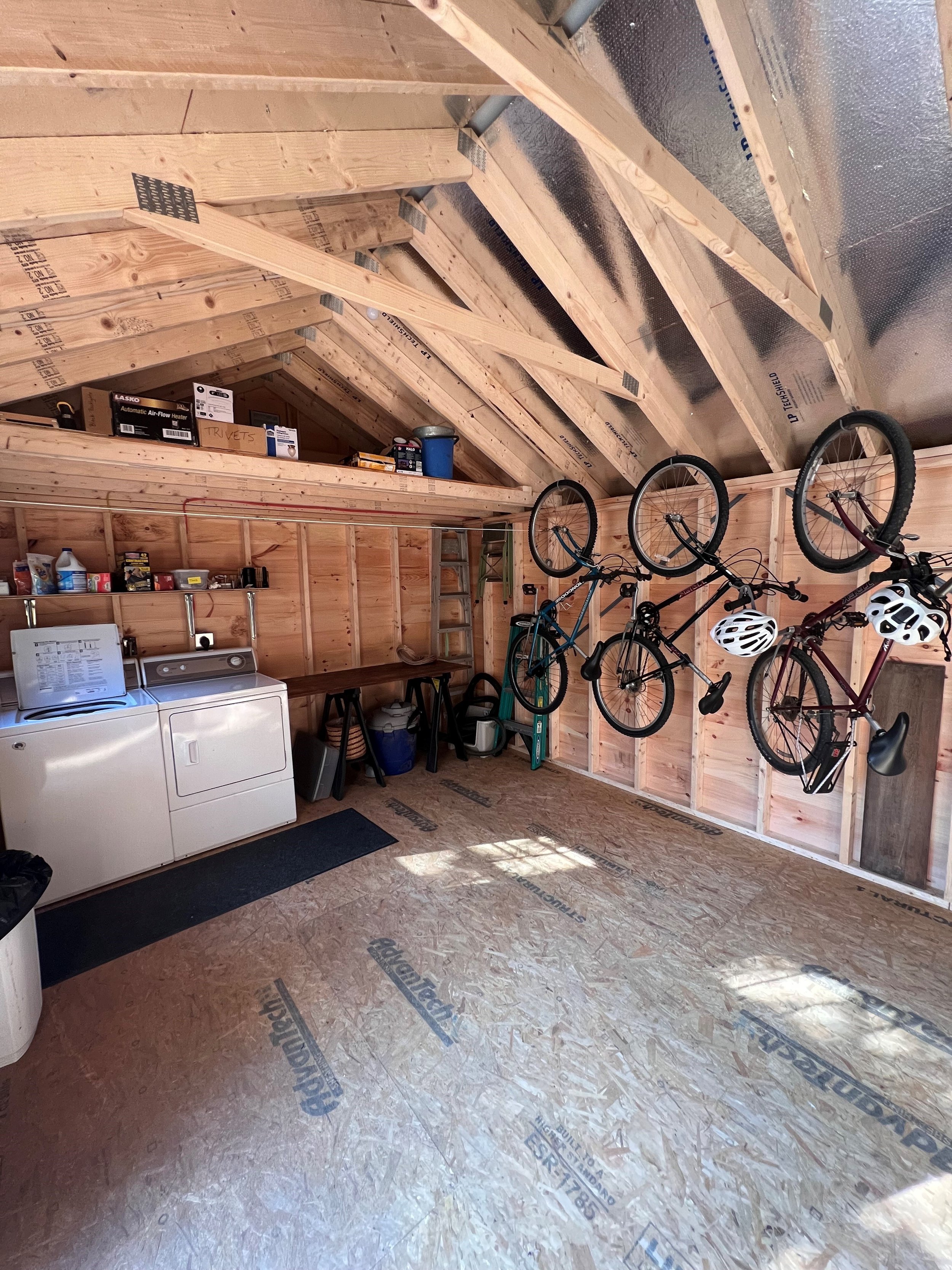 The shed — shared laundry and loaner bicycles